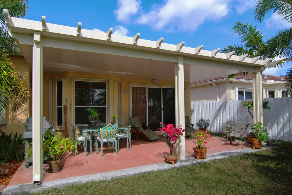 Naturewood pergola framing a landscaped terrace