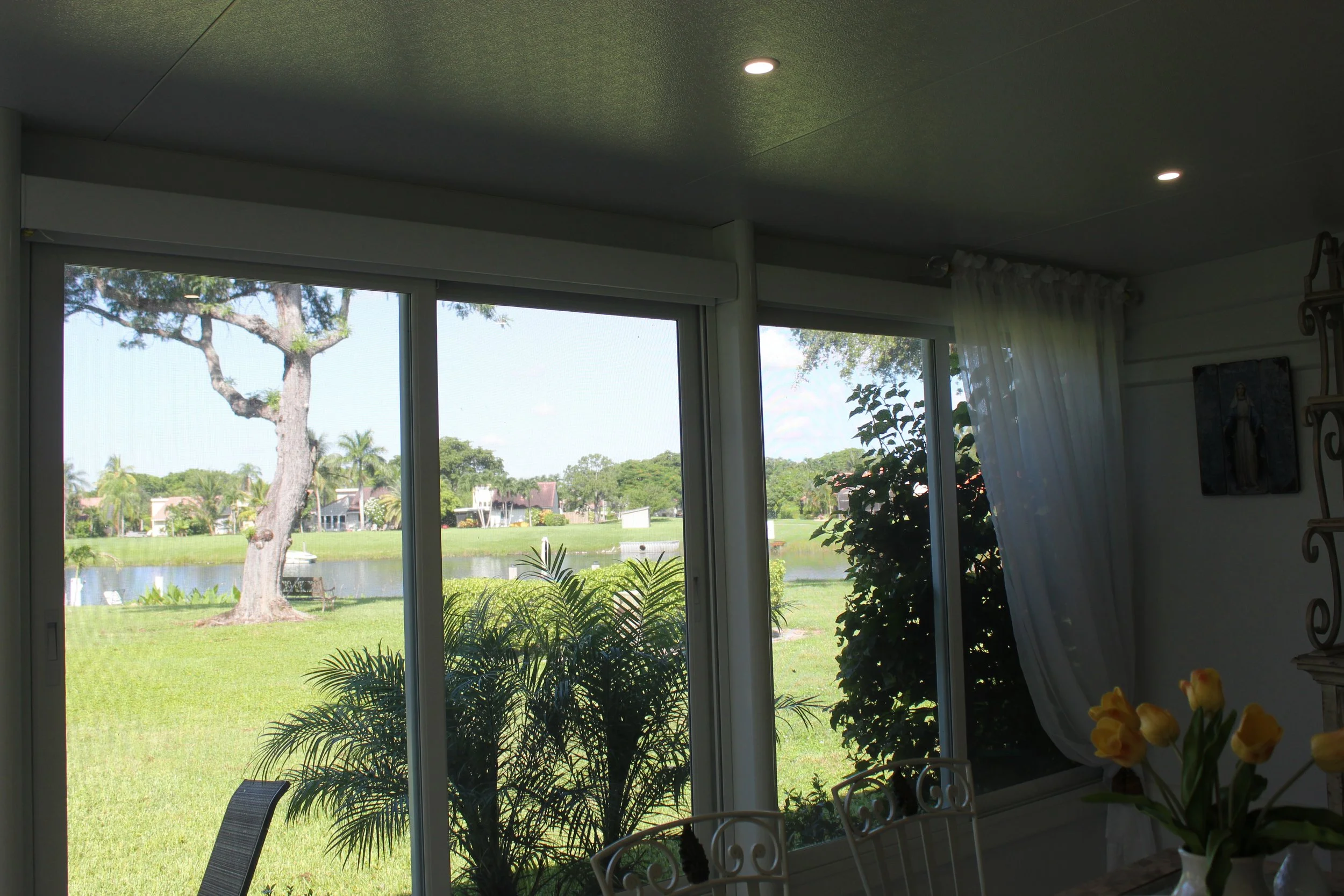 Residential sunroom formed with coordinated aluminum framing